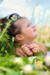 Cute Child Girl in Summer Meadow - Happy Childhood Concept