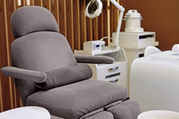 Fototapeta na wymiar Modern chair in spa salon
