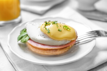 Eggs Benedict on plate, closeup