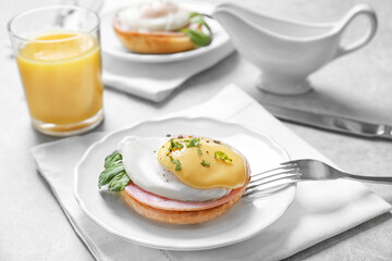 Tasty egg Benedict on plate