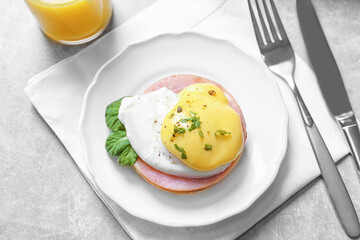 Tasty egg Benedict on plate