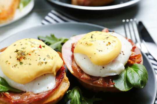 Tasty Eggs Benedict On Plate