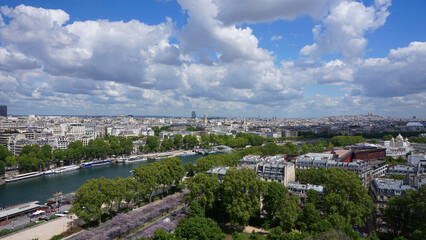 Fototapeta na wymiar Aerial view of city of Paris from Eiffel tower with beautiful scattered clouds, Paris, France