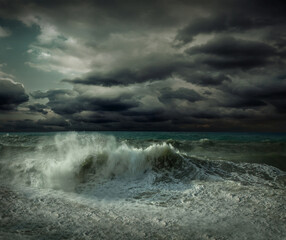 View of great storm on the sea. Strong wind and big waves with s