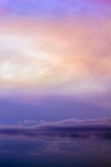 Sunset, purple and multicolored sky, cloudscape background.