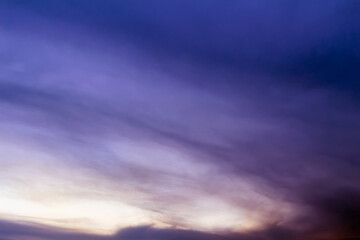 Sunset, purple and multicolored sky, cloudscape background.