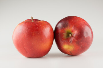 Red apples on a white background