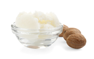 Shea butter in bowl and nuts isolated on white