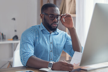 Young african man working in the office business