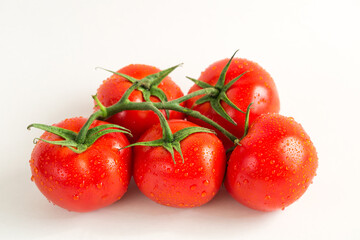 Red fresh tomatoes isolated on white background