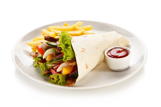 Tortilla wrap with french fries on white background 