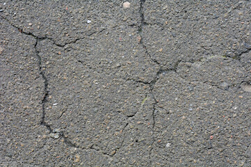 Cracks on the asphalt.