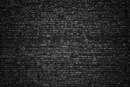 black wall, brick texture, dark background