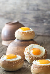 Egg-in-a-hole buns on the wooden board