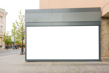 Mock up of big store blank showcase window in a city - obrazy, fototapety, plakaty