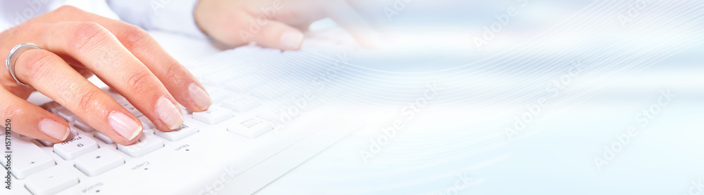 Leinwandbilder hands typing on computer keyboard.