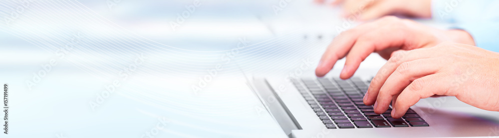 Aufkleber hands typing on computer laptop.