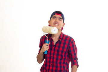 Young man in snapback holding roll