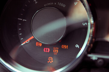 Many different car dashboard lights in closeup - obrazy, fototapety, plakaty