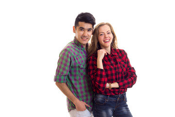 Naklejka premium Young couple in plaid shirts