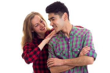 Young couple in plaid shirts