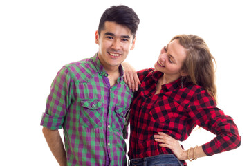 Young couple in plaid shirts