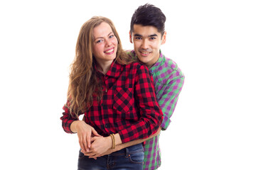 Fototapeta premium Young couple in plaid shirts
