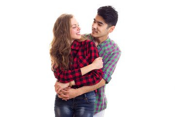 Young couple in plaid shirts