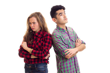 Young couple in plaid shirts