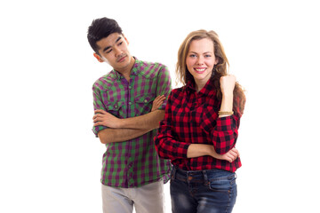 Young couple in plaid shirts