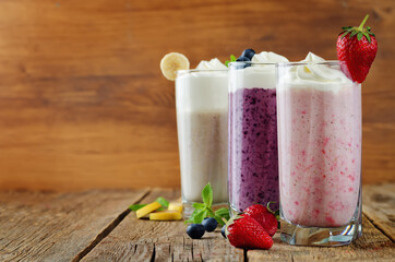 set of milkshakes: banana, strawberry and blueberry