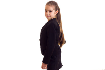 Little girl in black jacket holding diplomat 