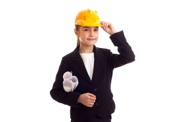 Little girl in yellow protective helmet