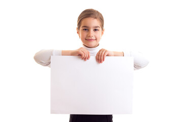 Little girl holding white banner