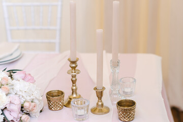 Guest table with with luxury candlesticks, closeup