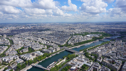 Fototapeta na wymiar Aerial view of river Seine from Eiffel tower with beautiful scattered clouds, Paris, France