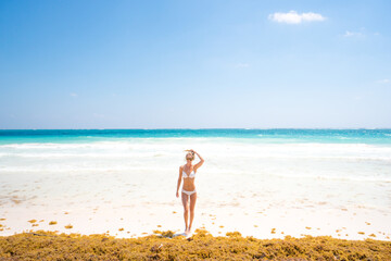 Woman on the beach in Caribbean