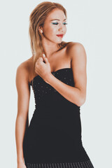 Fototapeta premium Young woman wearing party dress.