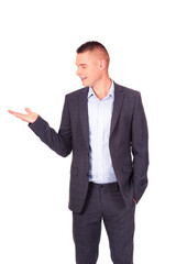 Smiling businessman holding copyspace