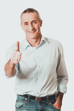 Portrait of mature man gesturing ok sign