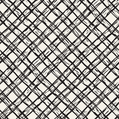 Hand drawn seamless plaid pattern. Allover pattern with ink doodle grunge grid. Graphic background with tartan.
