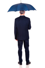 Full length back view businessman with umbrella