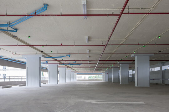 Parking garage interior, industrial building,empty space car park interior.