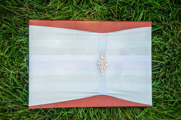 Festive folder on a green lawn