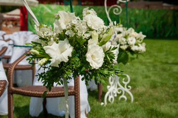 Beautifully decorated wedding reception outdoors. Wedding decor.