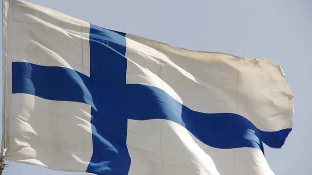 Finland flag is fluttering in wind.