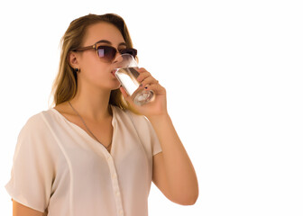 Young pretty girl drinks fresh water  