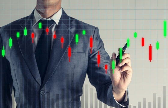 Businessman is pointing on growth up hologram chart graph, business background.