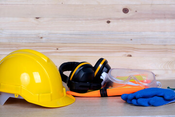 Standard construction safety on wooden background