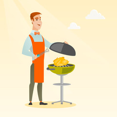 Man cooking chicken on barbecue grill.